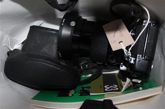 Canon EF 35mm camera and an Asahi Pentax camera & manual